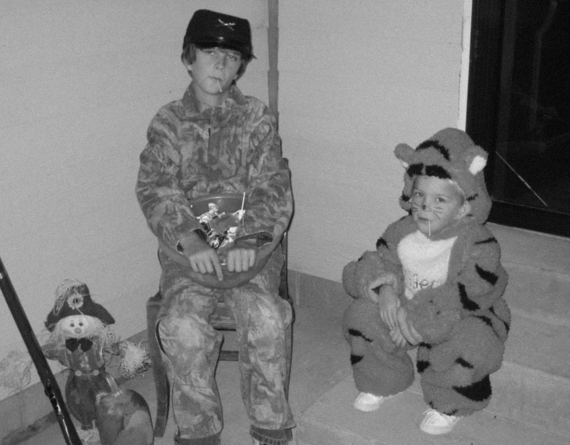 Aaron and Isaac Jarnagin as kids in Halloween costumes