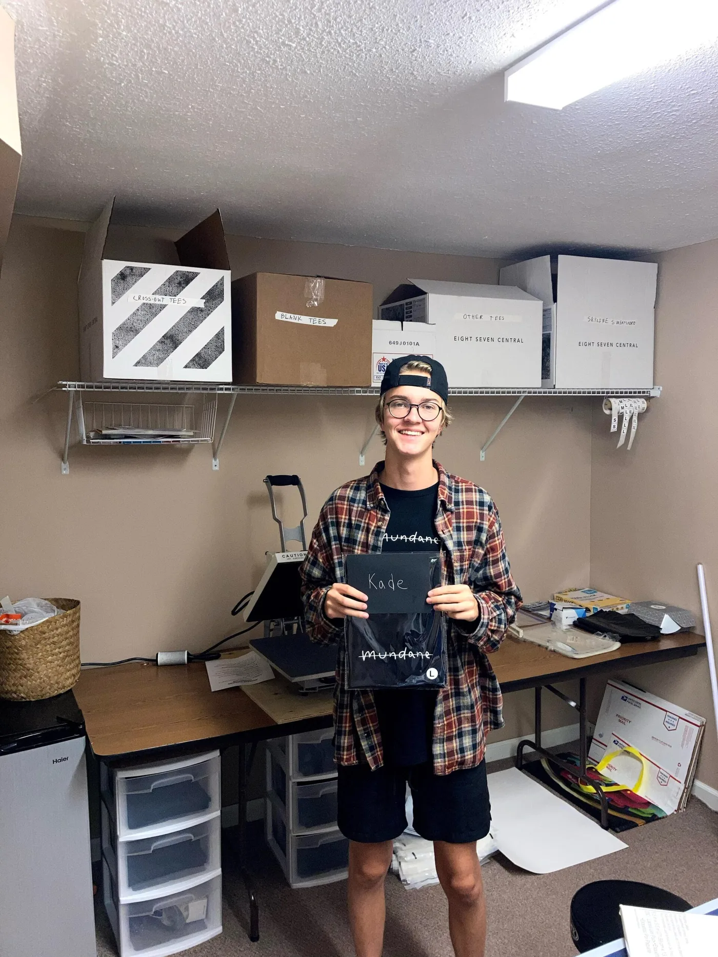 Isaac's basement "warehouse." He sent every customer a photo of himself holding their order.
